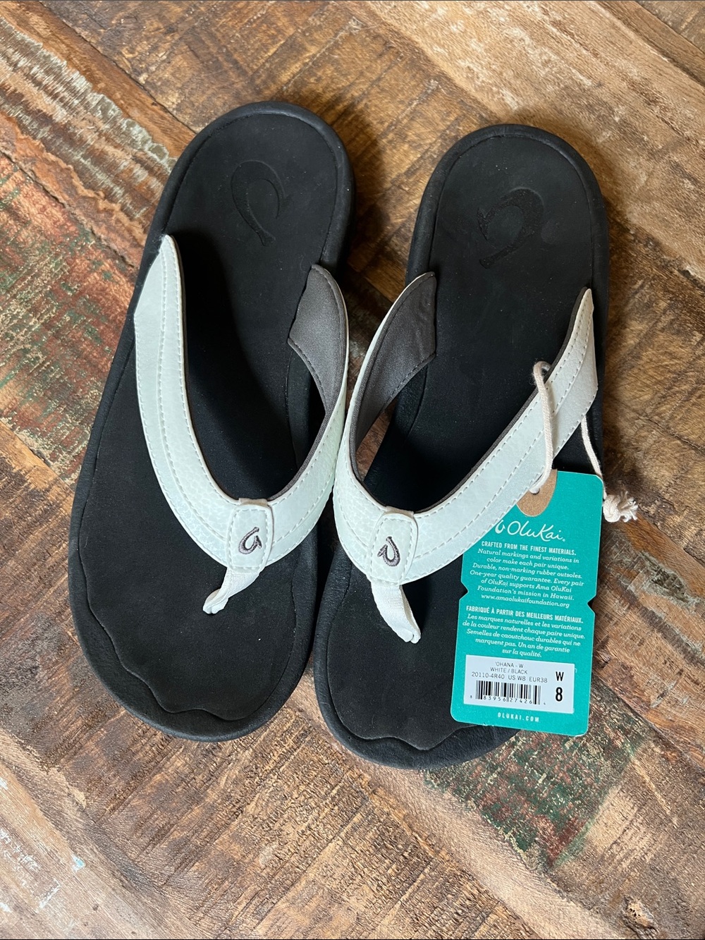 OluKai Women's White and Black Flip Flop Sandals - Picture 14 of 14